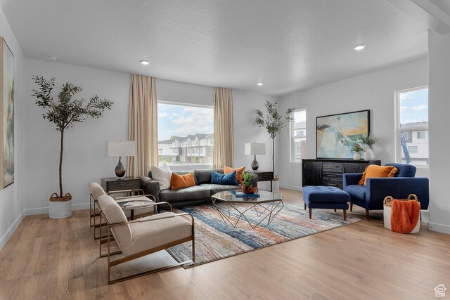 419 S 1130 W Unit 208, American Fork, UT 84003 - living room featuring recessed lighting, light wood-style flooring, and baseboards