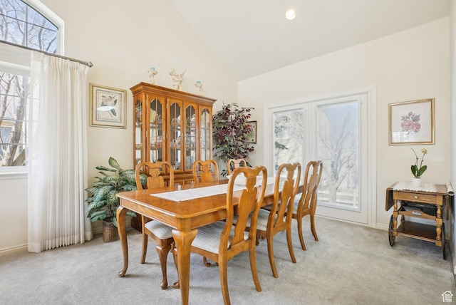 1367 W Settlement Dr, Park City, UT 84098 - dining space featuring high vaulted ceiling, light carpet, and a healthy amount of sunlight