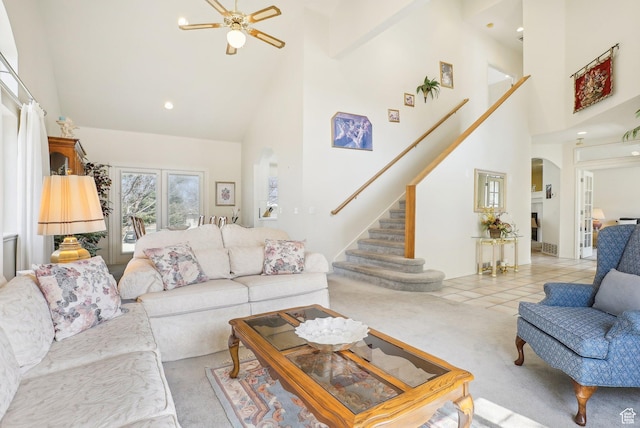 1367 W Settlement Dr, Park City, UT 84098 - living area with carpet flooring, stairs, ceiling fan, high vaulted ceiling, and arched walkways