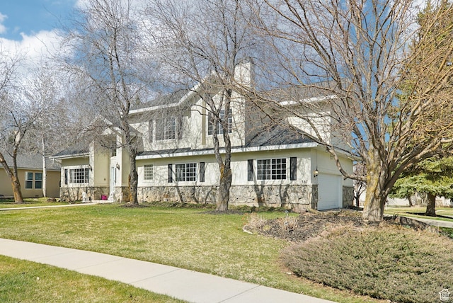 1367 W Settlement Dr, Park City, UT 84098 - view of front of home with an attached garage and a front lawn