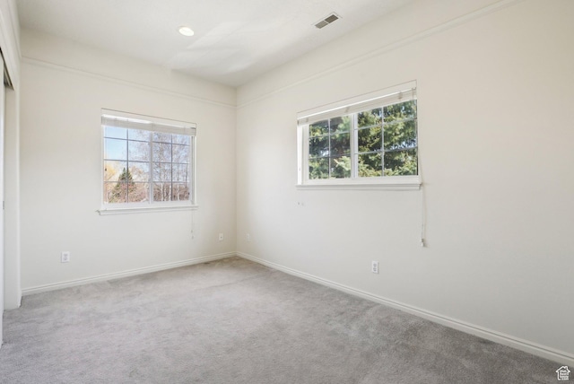1367 W Settlement Dr, Park City, UT 84098 - carpeted spare room with visible vents, baseboards, and a healthy amount of sunlight