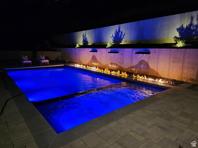 view of pool featuring a fenced in pool, a patio, and a fenced backyard