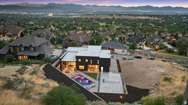 aerial view at dusk with a mountain view