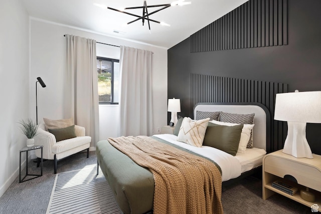 carpeted bedroom with a chandelier, visible vents, baseboards, and vaulted ceiling