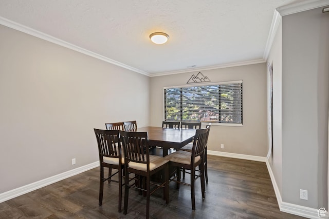 dining area with baseboards, ornamental molding, and dark wood finished floors