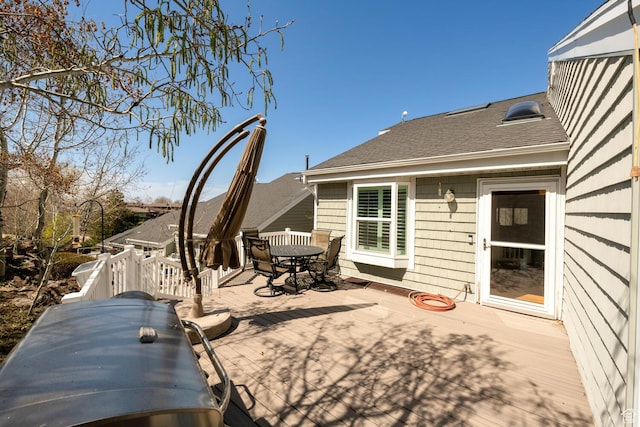 1960 S High Pointe St E Unit 22, Bountiful, UT 84010 - view of patio / terrace featuring outdoor dining area, a deck, and a grill