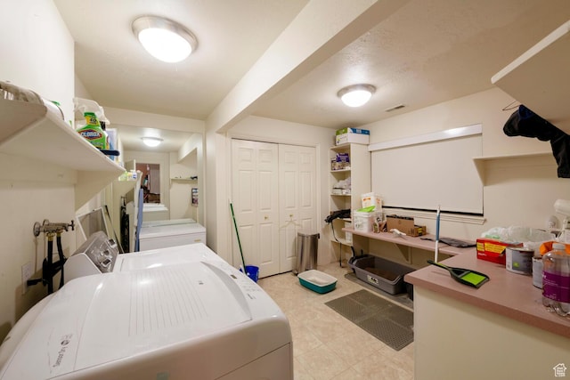 1960 S High Pointe St E Unit 22, Bountiful, UT 84010 - clothes washing area featuring washer and clothes dryer, visible vents, and laundry area