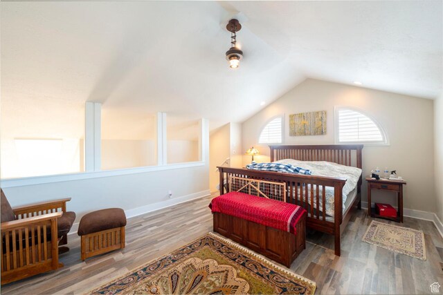 1960 S High Pointe St E Unit 22, Bountiful, UT 84010 - bedroom featuring baseboards, wood finished floors, and lofted ceiling
