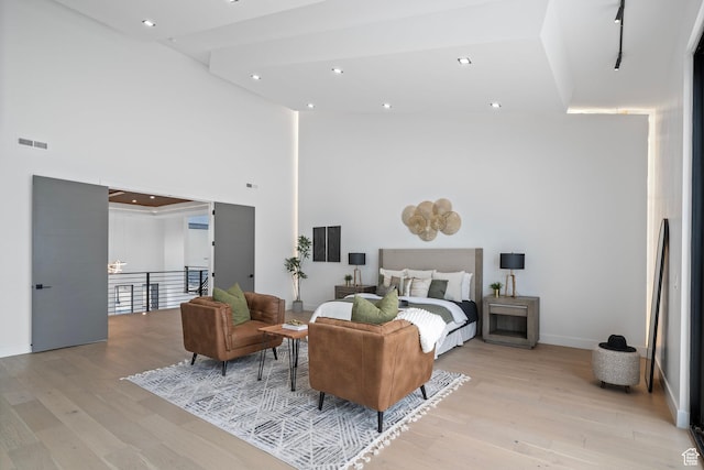 1582 S Wiltshire Ln, Saratoga Springs, UT 84045 - bedroom featuring a high ceiling, light wood finished floors, visible vents, and recessed lighting