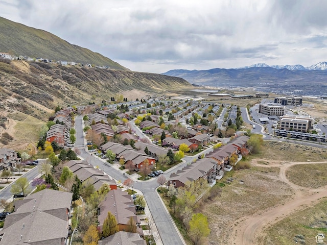 drone / aerial view with a mountain view and a residential view