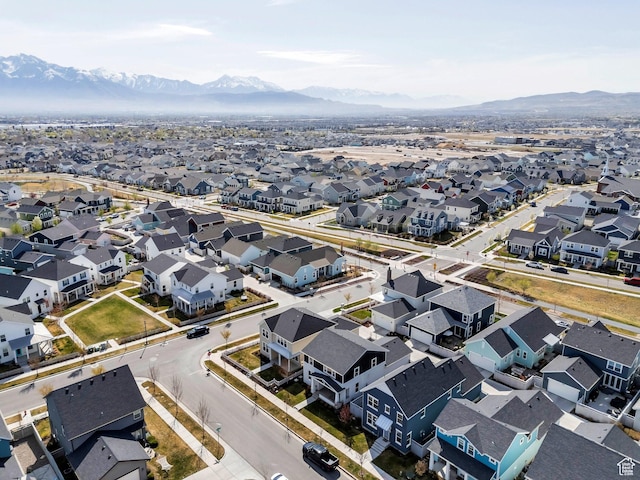 drone / aerial view featuring a mountain view and a residential view