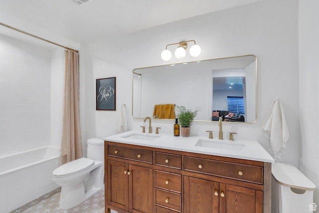 full bath featuring a sink, shower / tub combo, toilet, and double vanity