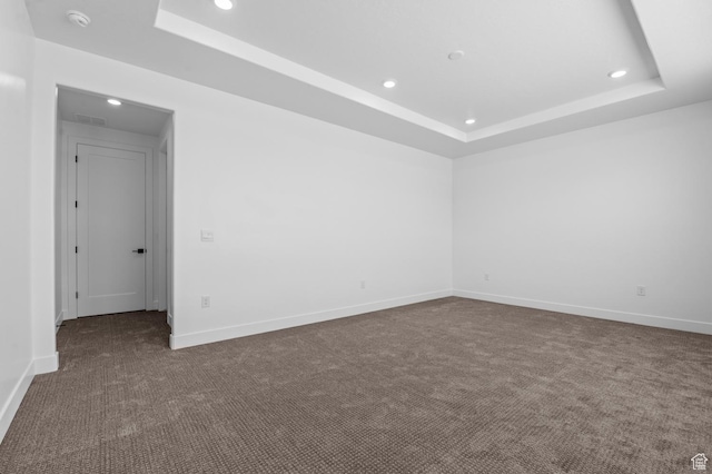 1489 E 820 N Unit 104, Salem, UT 84653 - unfurnished room with a raised ceiling, recessed lighting, dark carpet, and a smoke detector