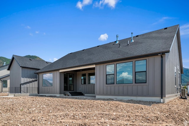 1489 E 820 N Unit 104, Salem, UT 84653 - rear view of property with board and batten siding and a shingled roof