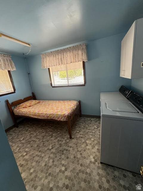 1640 S Bear Lake Blvd, Garden City, UT 84028 - bedroom with washing machine and clothes dryer and baseboards