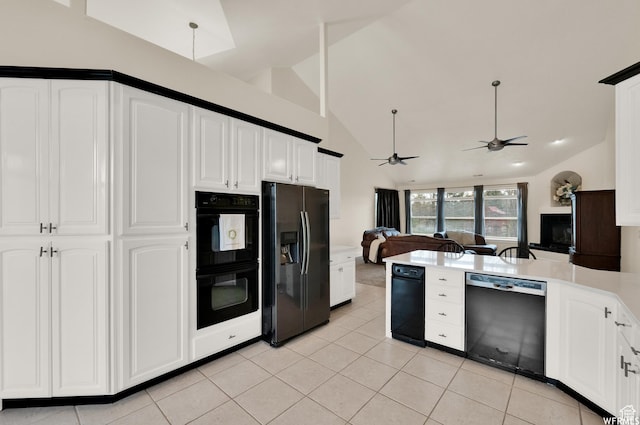 1141 S Waterside Dr, Saratoga Springs, UT 84045 - kitchen featuring light tile patterned floors, a peninsula, white cabinetry, ceiling fan, and black appliances