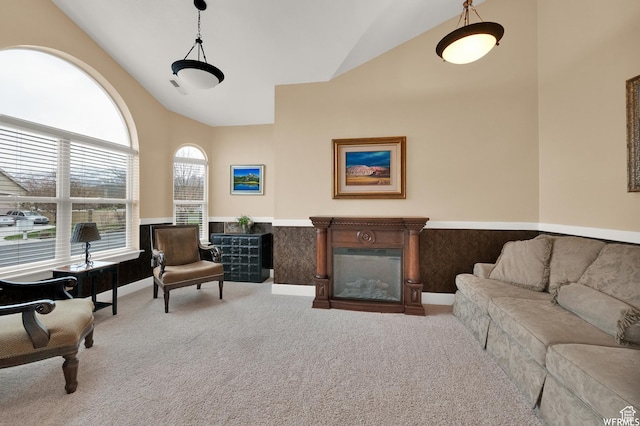 1141 S Waterside Dr, Saratoga Springs, UT 84045 - living room featuring carpet floors, a wainscoted wall, high vaulted ceiling, and visible vents