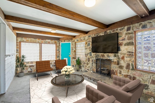 3478 S 500 E, South Salt Lake, UT 84106 - living room featuring beamed ceiling and a stone fireplace