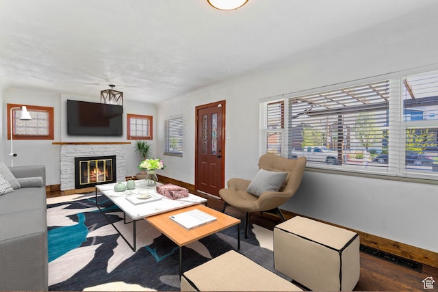 3478 S 500 E, South Salt Lake, UT 84106 - living area featuring wood finished floors and a stone fireplace