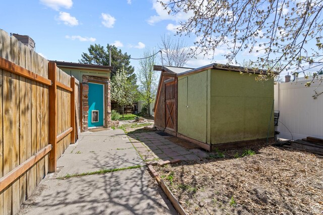 3478 S 500 E, South Salt Lake, UT 84106 - fenced backyard featuring a storage shed and a patio area