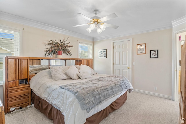 bedroom with crown molding, baseboards, ceiling fan, and light carpet