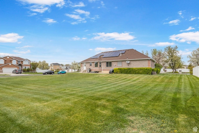 view of yard featuring a residential view