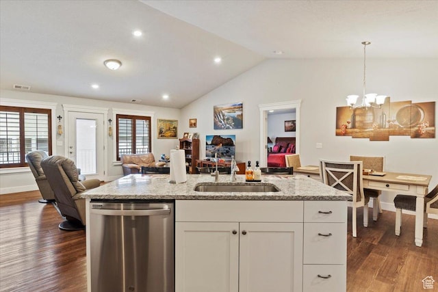 kitchen with open floor plan, dishwasher, a sink, and dark wood-style floors