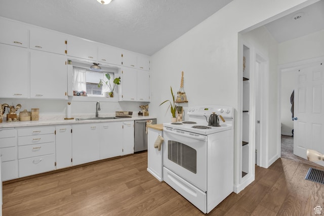 kitchen featuring white electric range, light wood-type flooring, dishwasher, light countertops, and a sink
