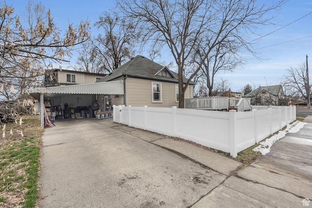 view of home's exterior with a fenced front yard