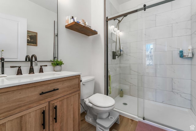 11407 S Oswego Ln, South Jordan, UT 84009 - full bath featuring a shower stall, wood finished floors, vanity, and toilet