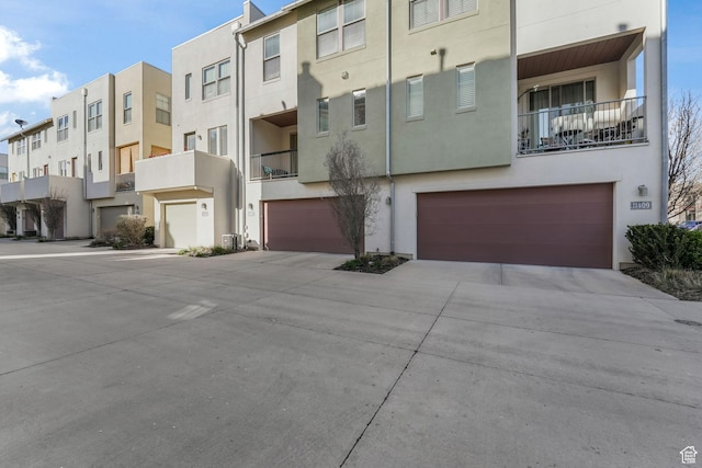 11407 S Oswego Ln, South Jordan, UT 84009 - view of property with an attached garage, a residential view, and concrete driveway
