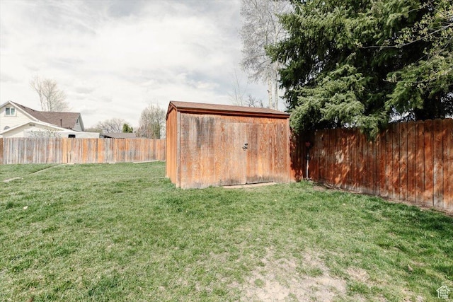 95 S 200 W, Lewiston, UT 84320 - view of yard with an outbuilding, a fenced backyard, and a storage unit