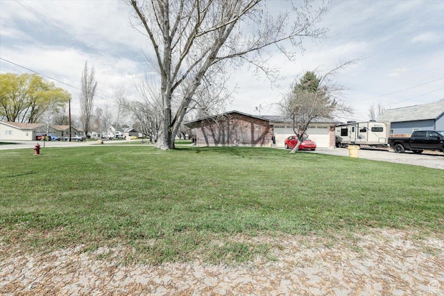 95 S 200 W, Lewiston, UT 84320 - view of yard with driveway and a garage