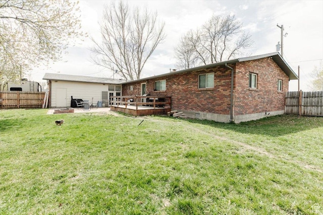 95 S 200 W, Lewiston, UT 84320 - rear view of property with a yard, crawl space, fence, a patio, and brick siding
