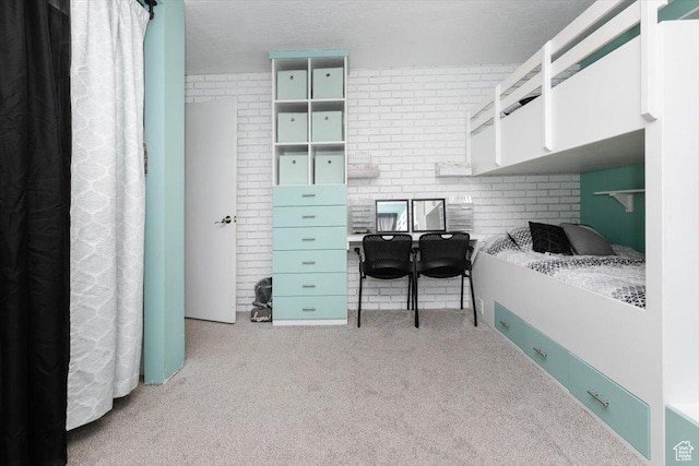 95 S 200 W, Lewiston, UT 84320 - carpeted bedroom with brick wall
