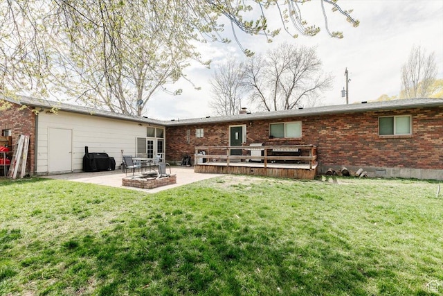 95 S 200 W, Lewiston, UT 84320 - back of property featuring crawl space, a patio, a yard, and brick siding