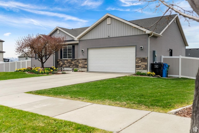craftsman-style home with a garage, stone siding, and fence