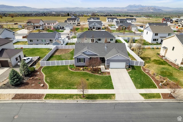 aerial view with a mountain view and a residential view