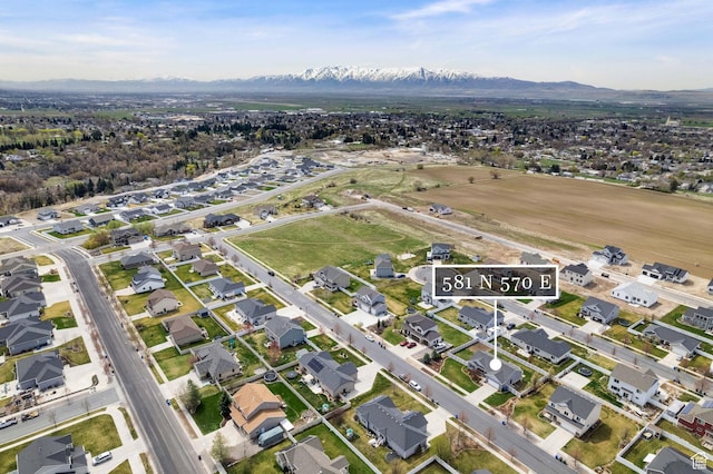 bird's eye view featuring a mountain view and a residential view