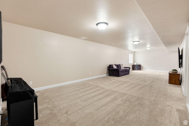 interior space featuring baseboards and carpet floors