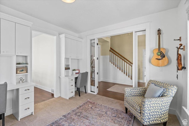 interior space with stairs and carpet floors
