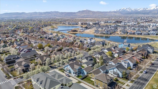 bird's eye view featuring a water and mountain view and a residential view