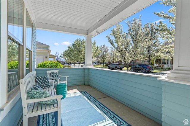 balcony featuring a porch
