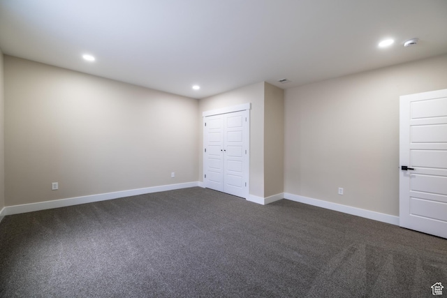 2899 E Lake Dr, Eagle Mountain, UT 84005 - unfurnished bedroom featuring dark carpet, baseboards, recessed lighting, and a closet