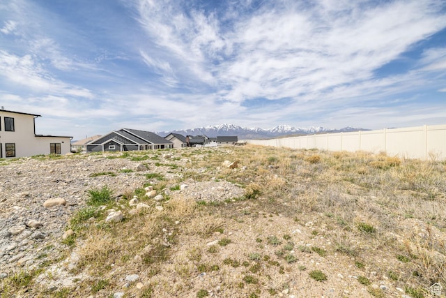 2899 E Lake Dr, Eagle Mountain, UT 84005 - view of yard featuring a mountain view and fence