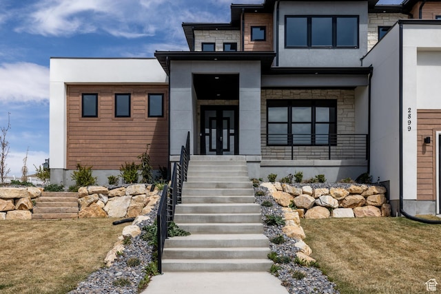 2899 E Lake Dr, Eagle Mountain, UT 84005 - view of front of house featuring stone siding and stucco siding