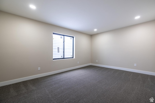 2899 E Lake Dr, Eagle Mountain, UT 84005 - unfurnished room featuring dark colored carpet, baseboards, and recessed lighting