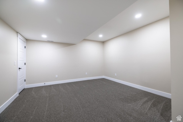 2899 E Lake Dr, Eagle Mountain, UT 84005 - finished below grade area with dark carpet, baseboards, visible vents, and recessed lighting