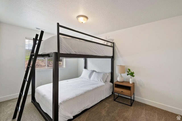 2250 S Beachcomber Ln, Garden City, UT 84028 - bedroom featuring carpet flooring, a textured ceiling, and baseboards