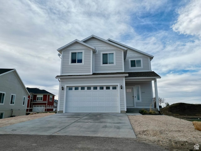 2250 S Beachcomber Ln, Garden City, UT 84028 - traditional-style house featuring concrete driveway and a garage